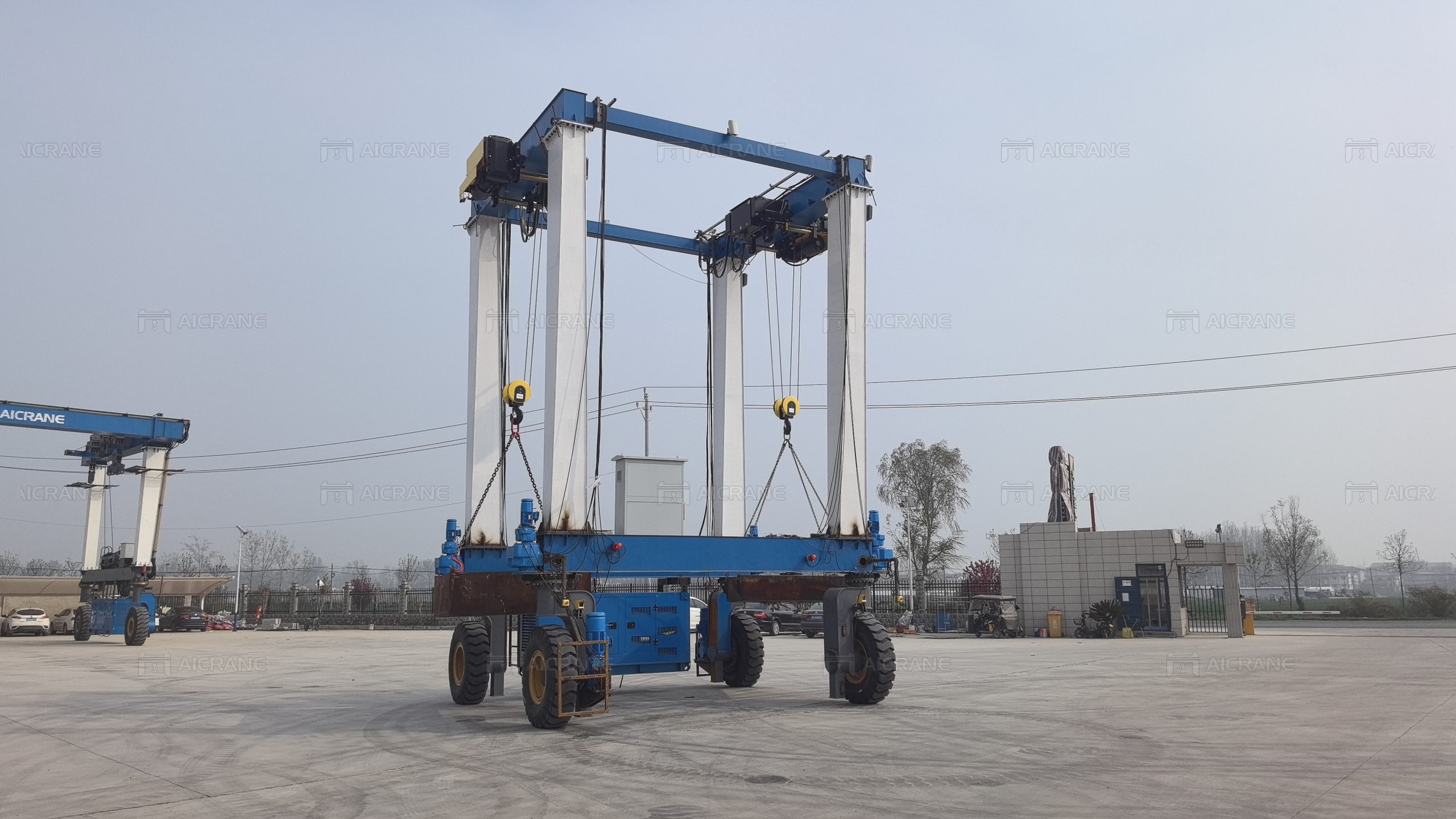 Aicrane Козловой кран на пневмоходу 16+16 тонн